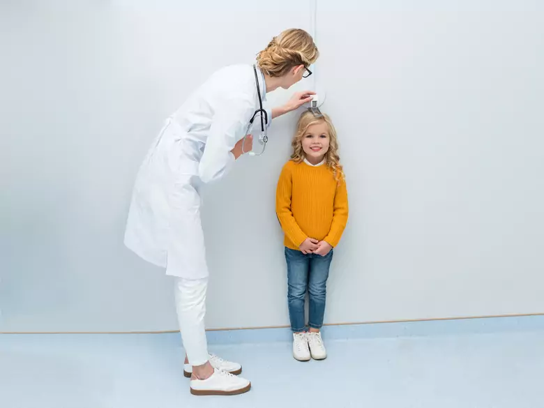When should a child's health check be carried out?