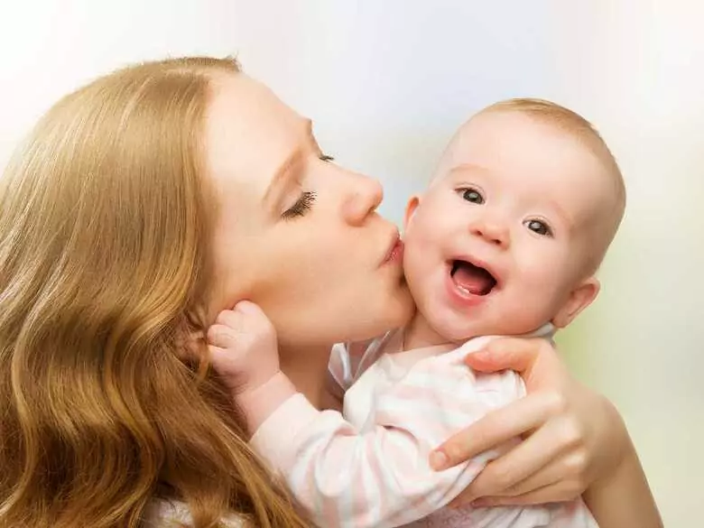 Why do mothers sing to their children?