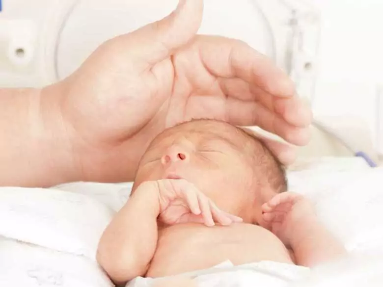 How do hiccups affect the infant brain?