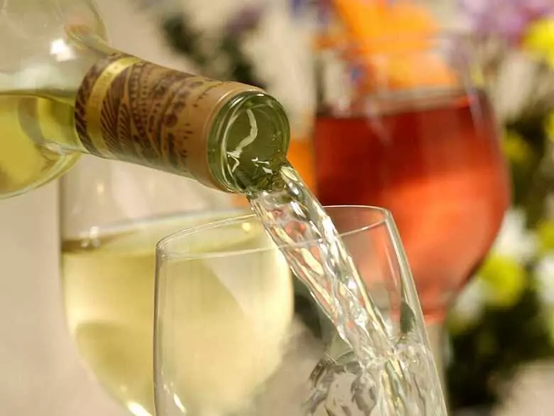 How can alcohol increase the risk of cancer?